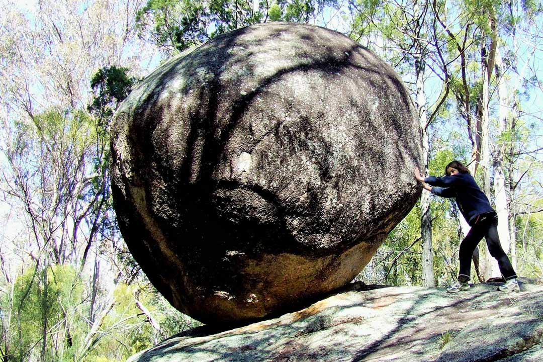 Pushing a granite boulder in Namadgi National Park