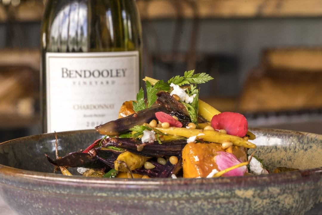 Salad and wine available at Bendooley Estate, Berrima in the Southern Highlands.