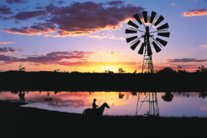 Outback sunset over waterhole