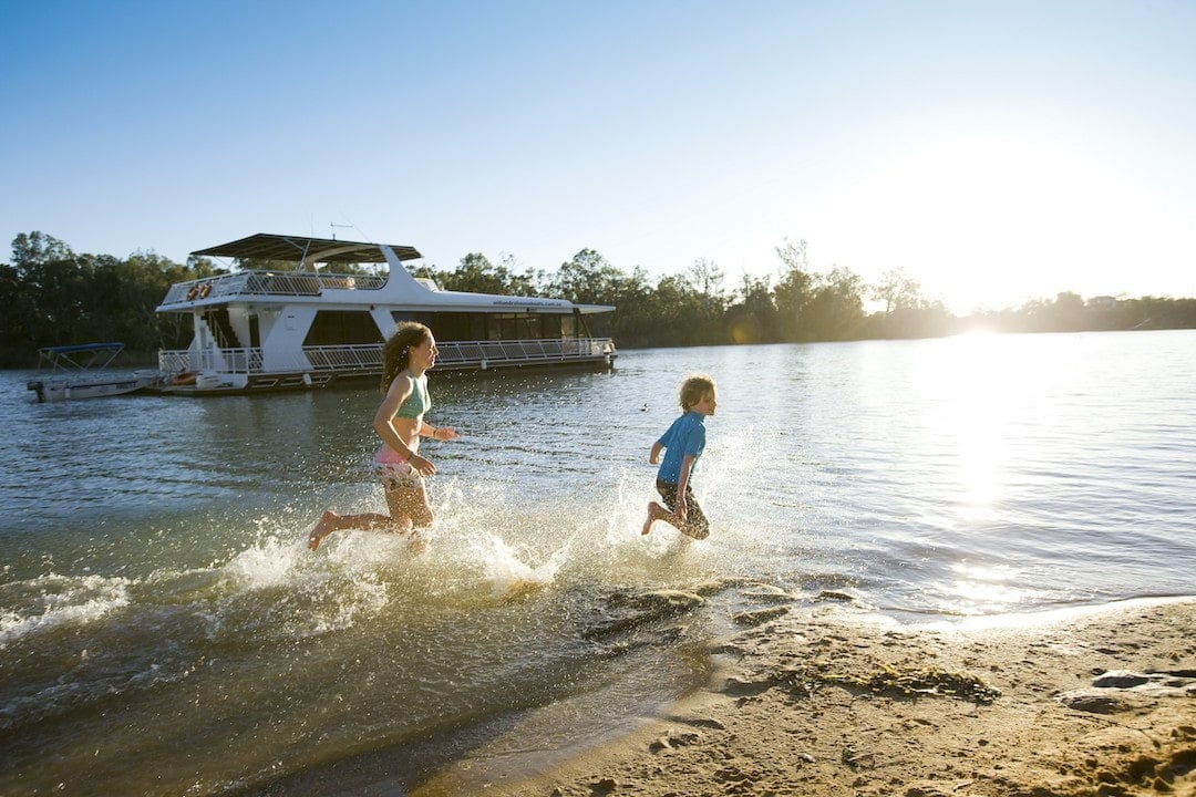 Children play by the banks of the Murray River at Mildura
