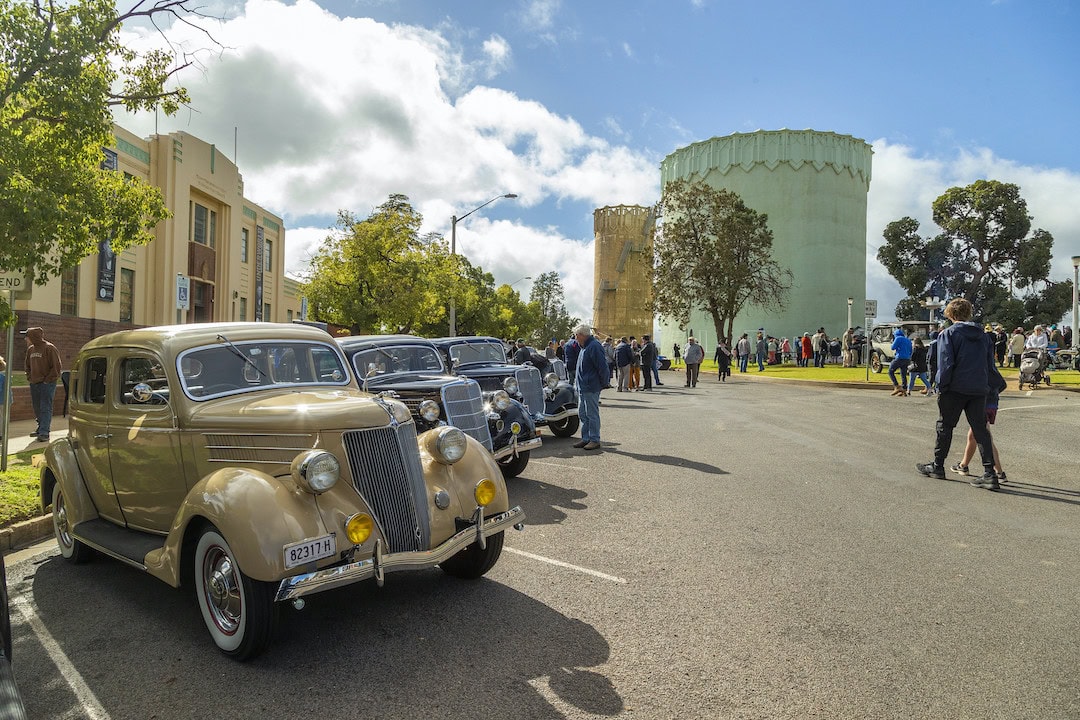 Art deco buildings and cars in Leeton at the Australian Art Deco Festival.