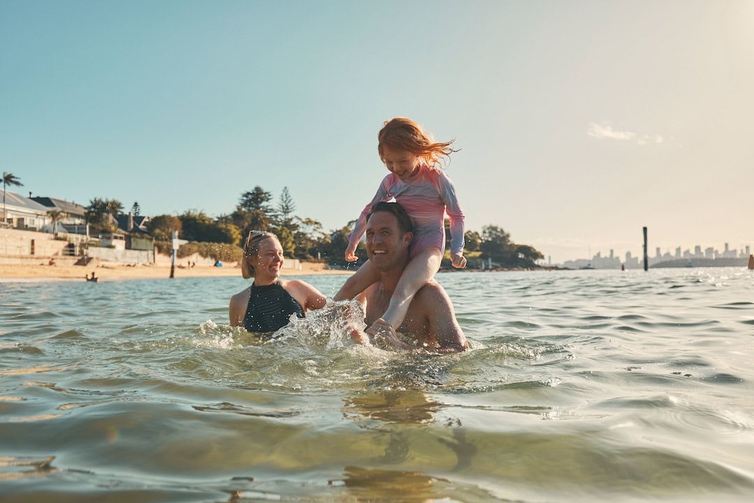 Family enjoying Camp Cove, one of the best Sydney Harbour beaches. Photo: Destination NSW.